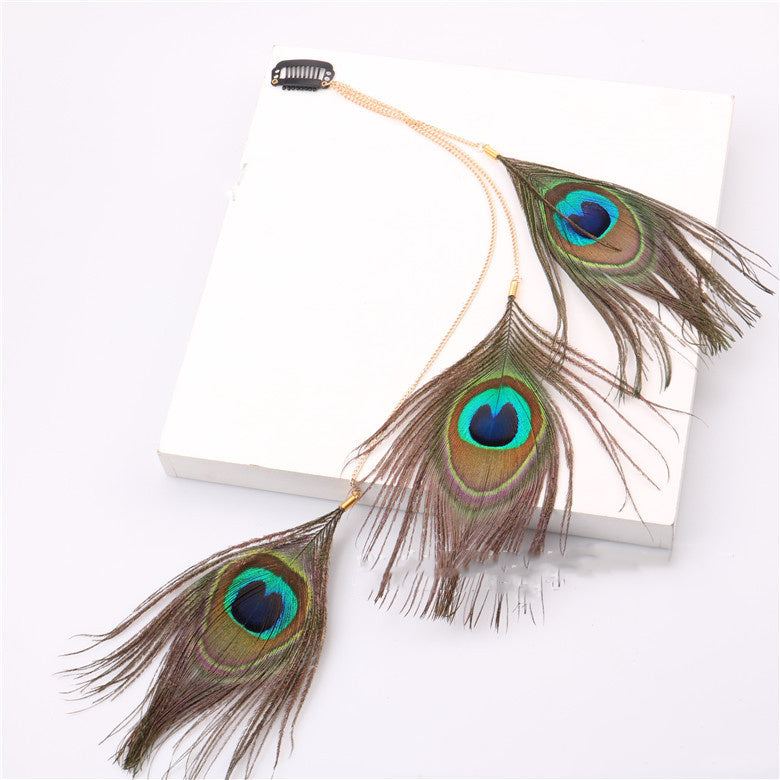Handmade peacock feather hair accessory