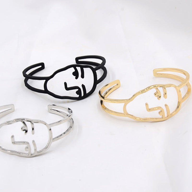 Abstract hollow smiley bracelet