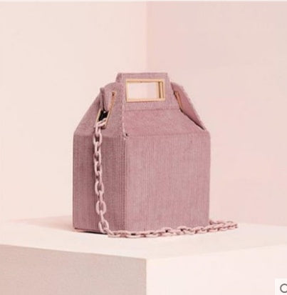 Autumn and winter new European and American niche design printing portable acrylic chain shoulder bag