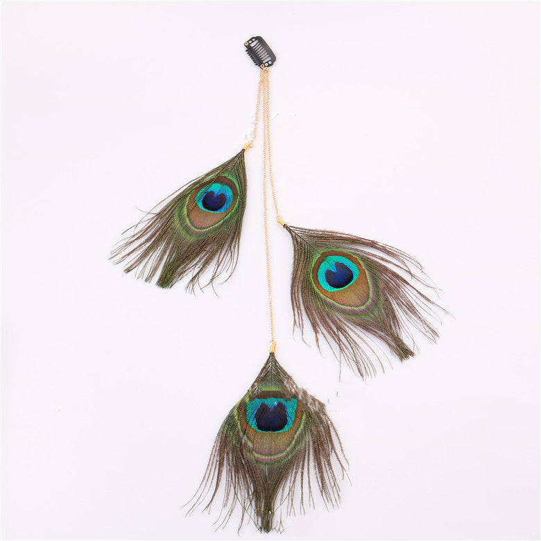 Handmade peacock feather hair accessory