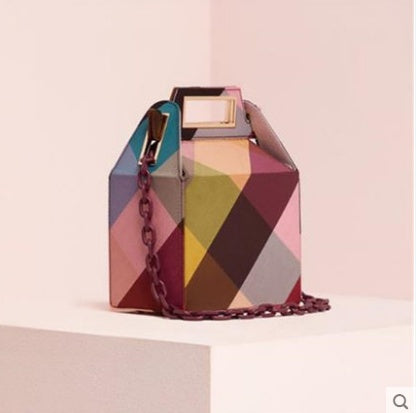 Autumn and winter new European and American niche design printing portable acrylic chain shoulder bag